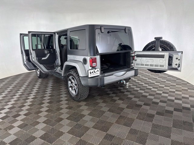 Used 2016 Silver Jeep Unlimited Sahara image 22