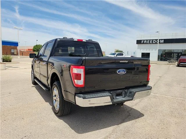 Used 2023 Agate Black Metallic Ford Lariat 4x4 SuperCrew Cab 6.5 ft. box 157 in. WB image 2
