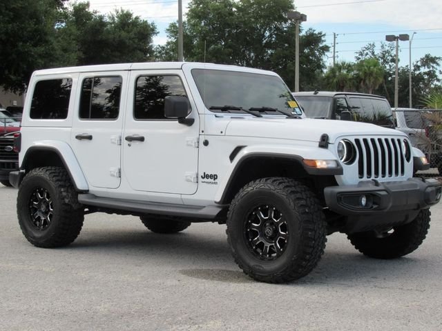 Used 2019 White Jeep Unlimited Sahara Altitude image 1