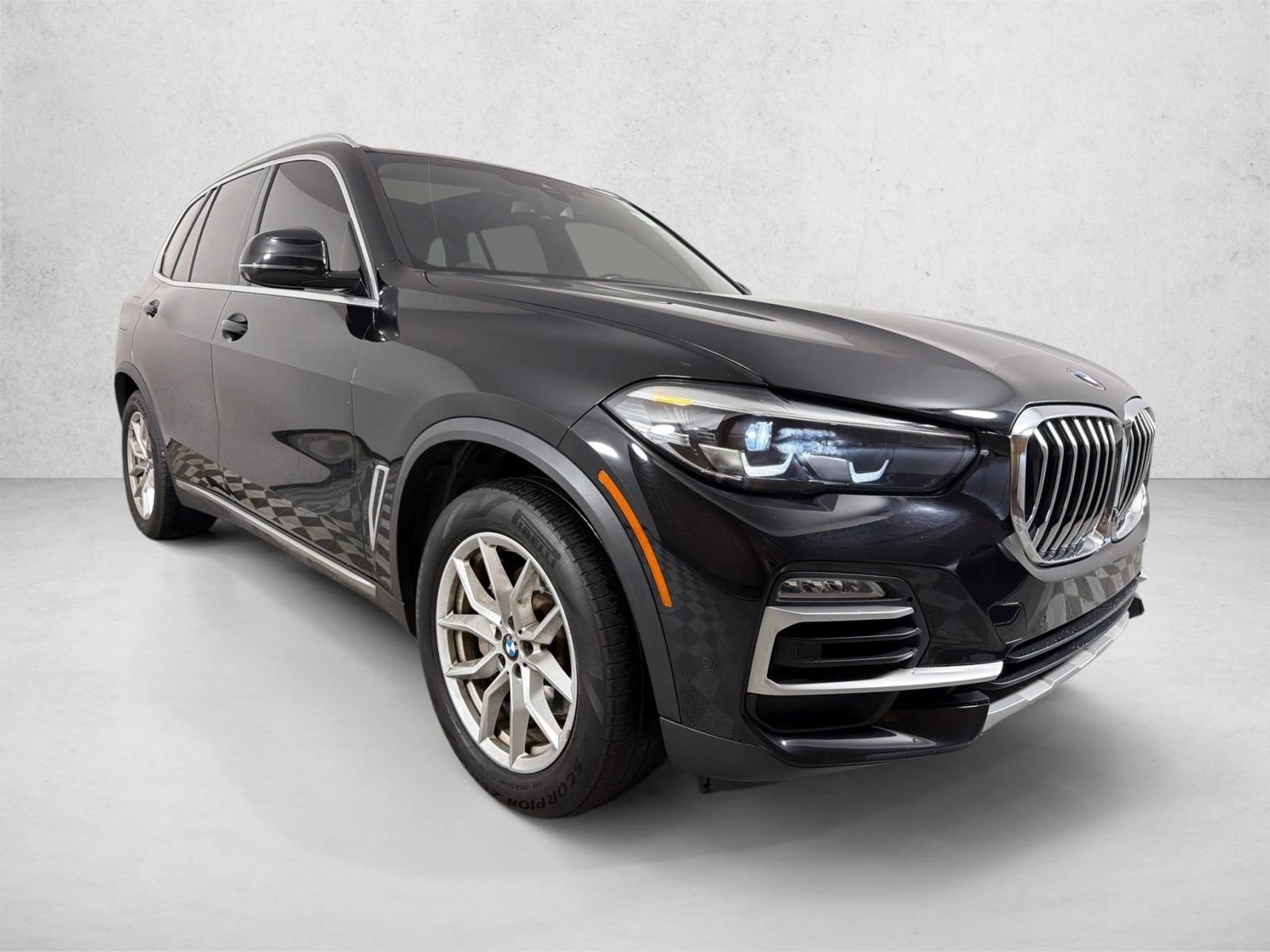 Used 2021 Jet Black BMW sDrive40i image 1