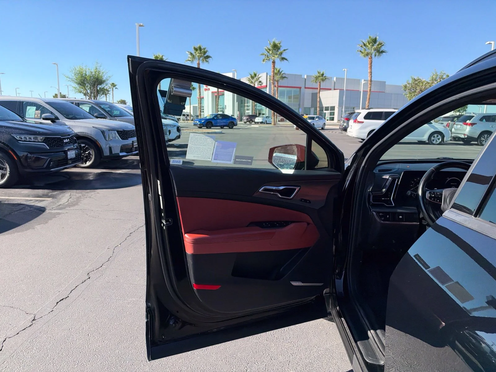 Used 2023 Ebony Black Kia SX-Prestige image 12