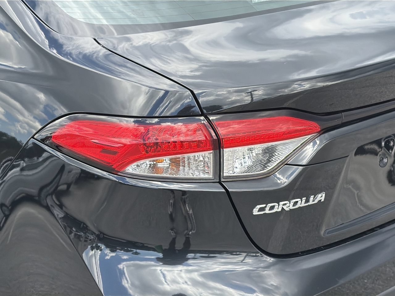 Used 2022 Black Sand Pearl Toyota LE image 7