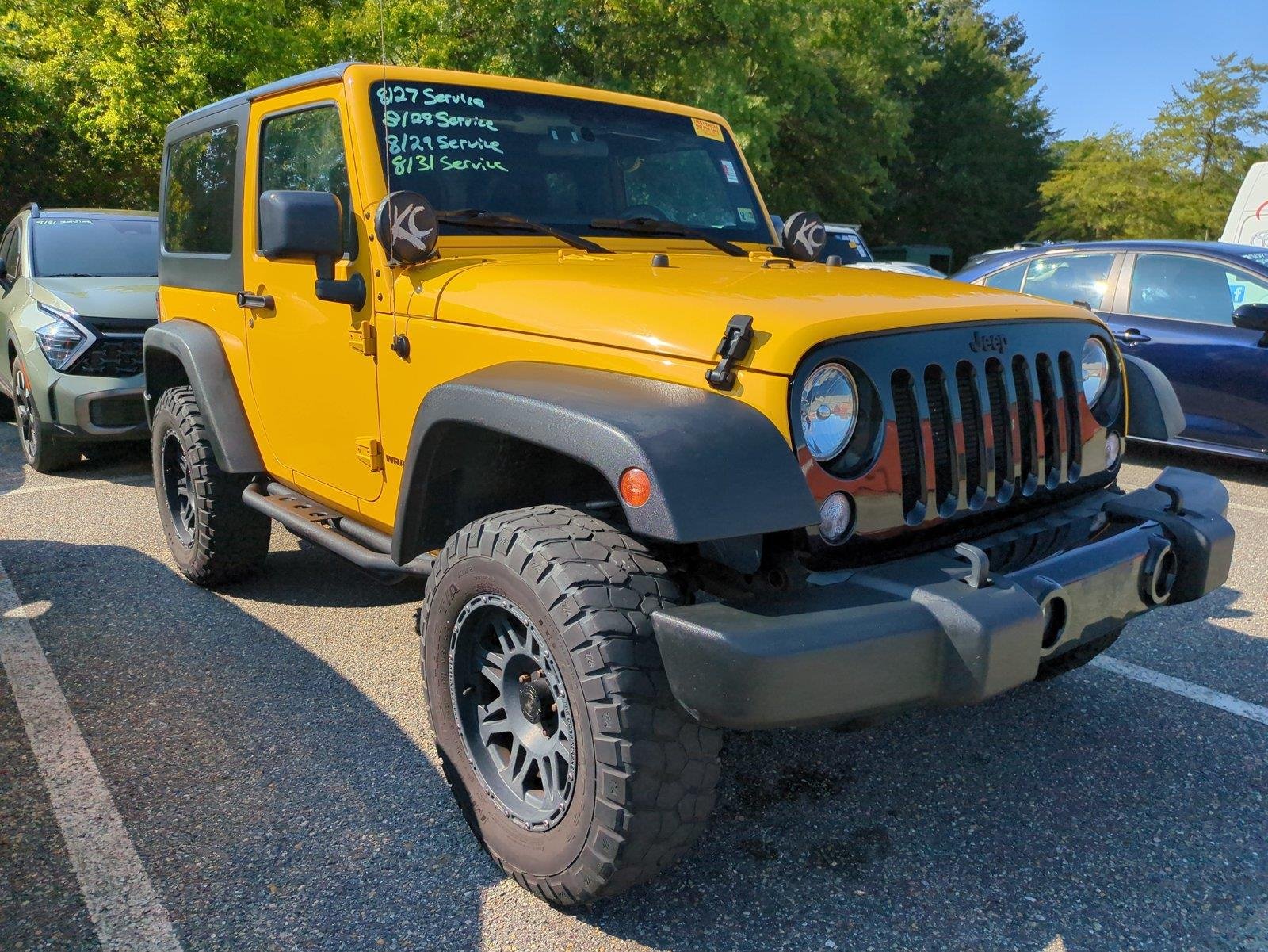 Used 2015 Baja Yellow Clearcoat Jeep Willys Wheeler image 1