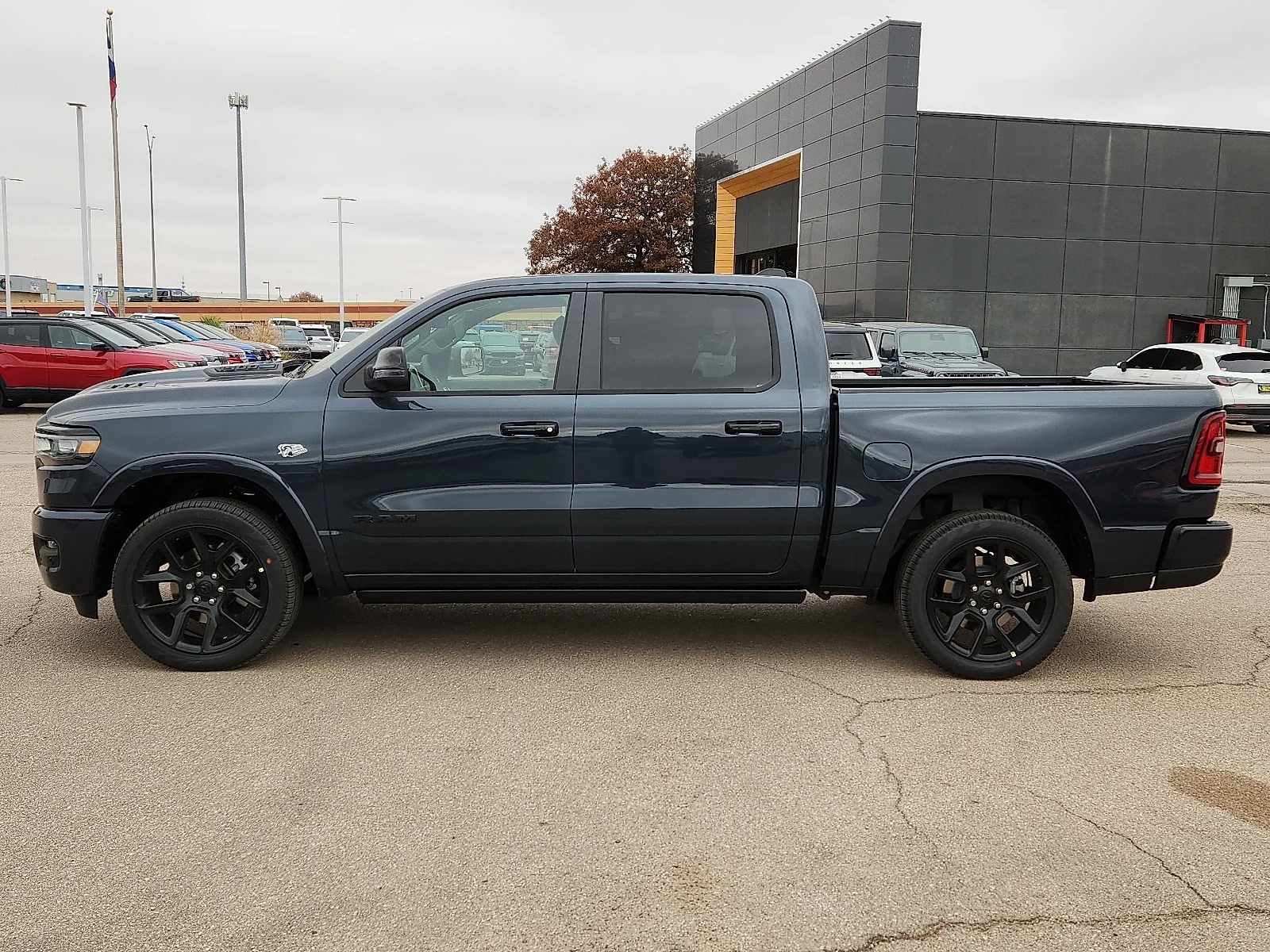 New 2026 Forged Blue Metallic  Paint Ram LARAMIE CREW CAB 4X4 5