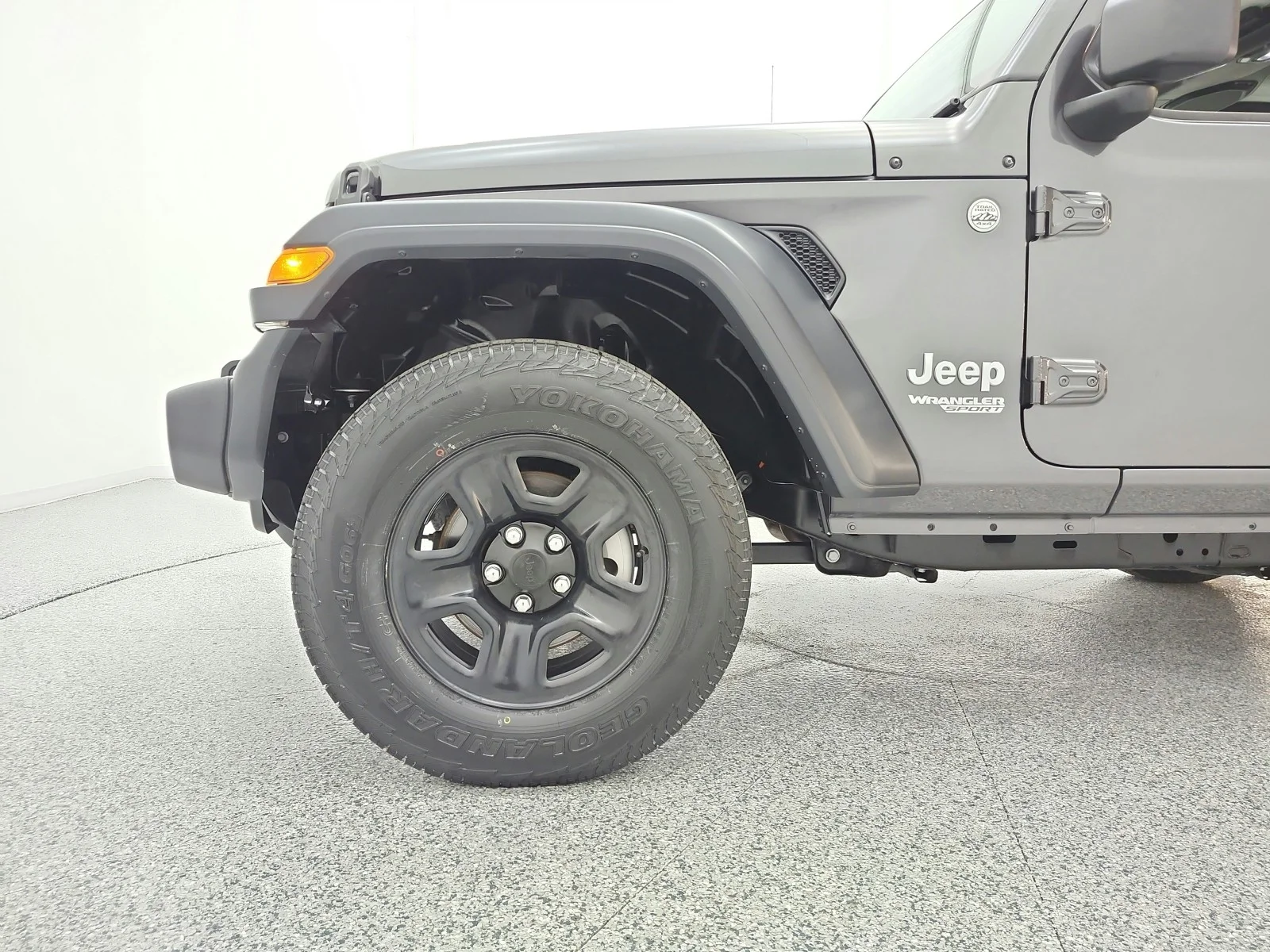 Used 2018 Granite Crystal Metallic Clearcoat Jeep Sport image 16