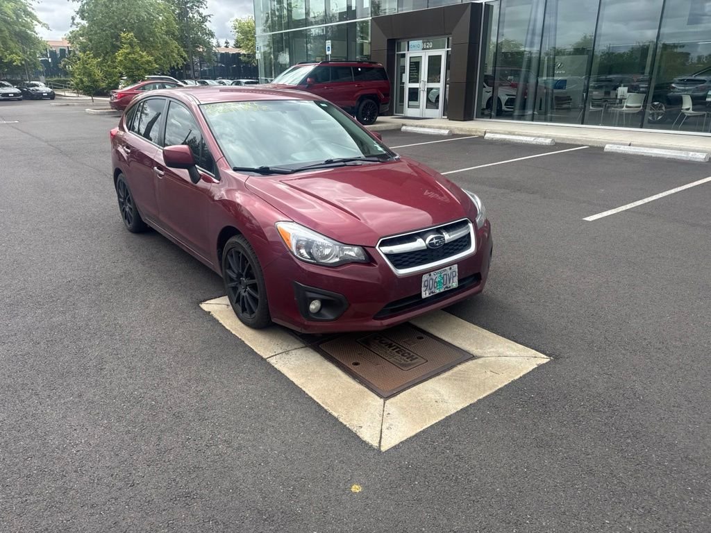 Used 2013 Red Subaru 2.0i Limited image 1
