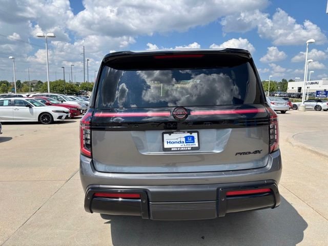 Used 2025 Gun Metallic/Super Black Nissan PRO-4X image 6