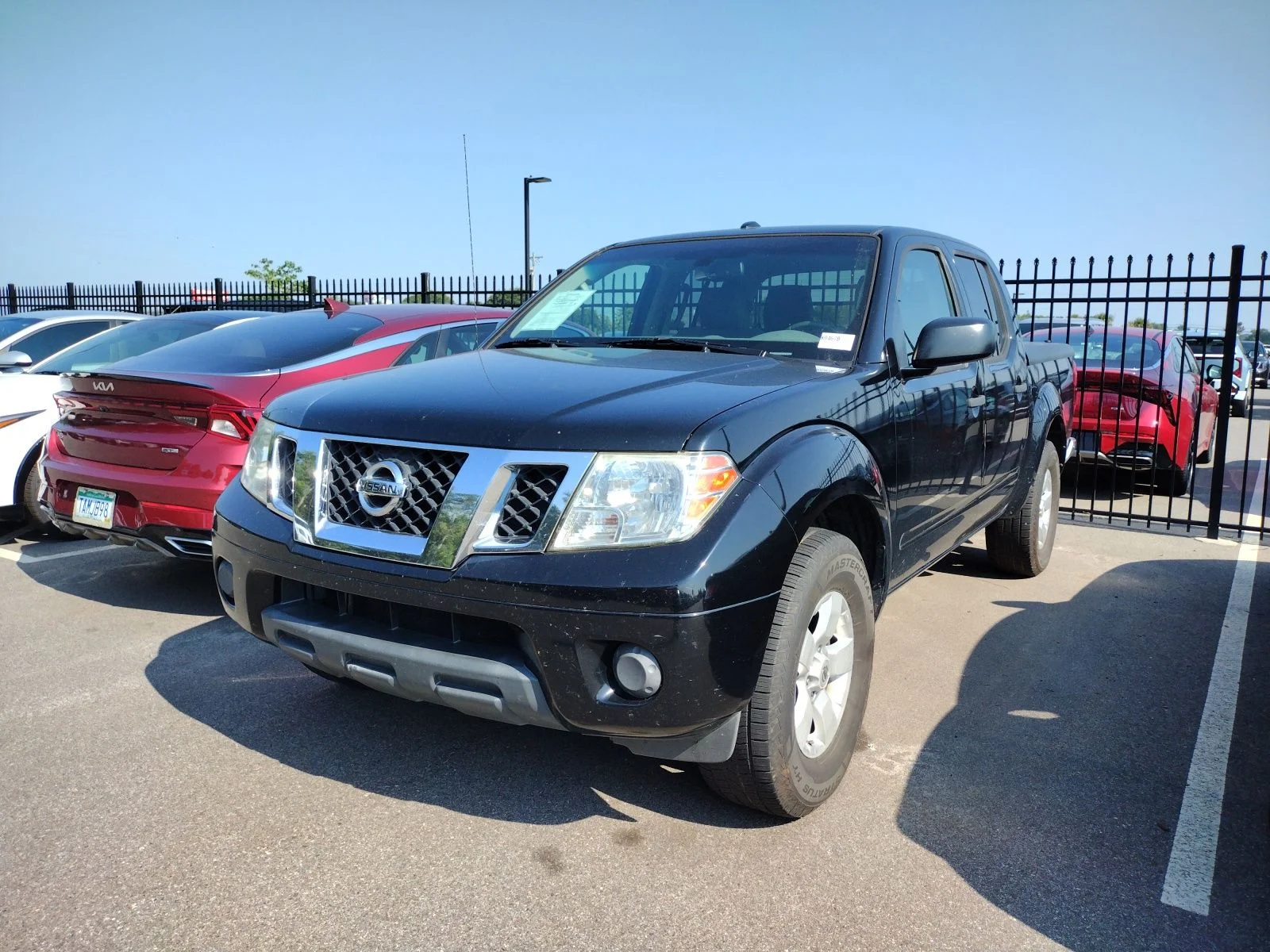Used 2012 Black Nissan SV image 2