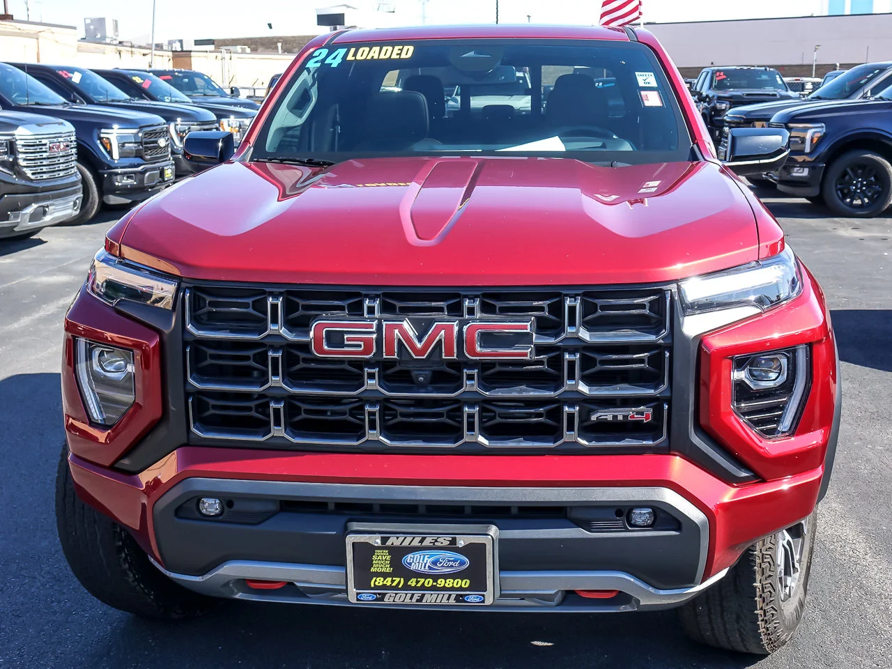 Used 2024 Volcanic Red Tintcoat GMC 4WD AT4 image 3