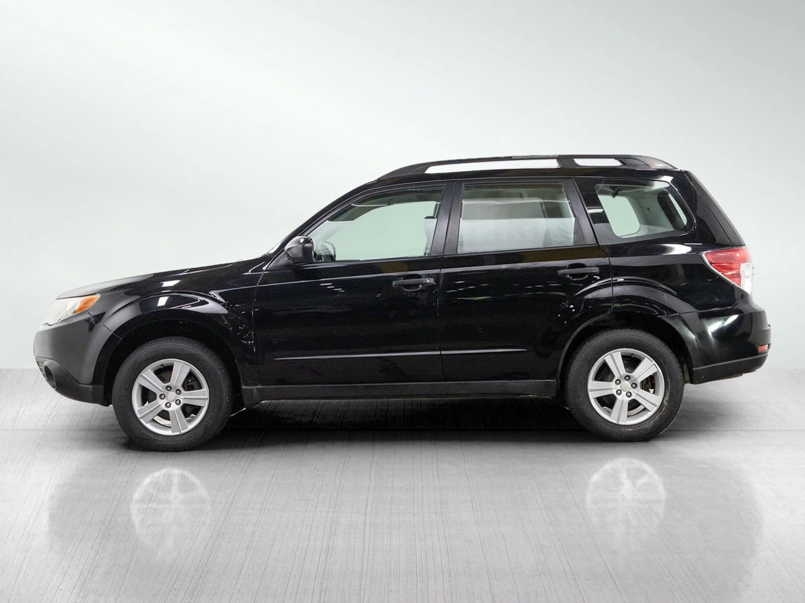 Used 2010 Subaru Forester X with VIN JF2SH6BC4AG800385 for sale in Burnsville, Minnesota