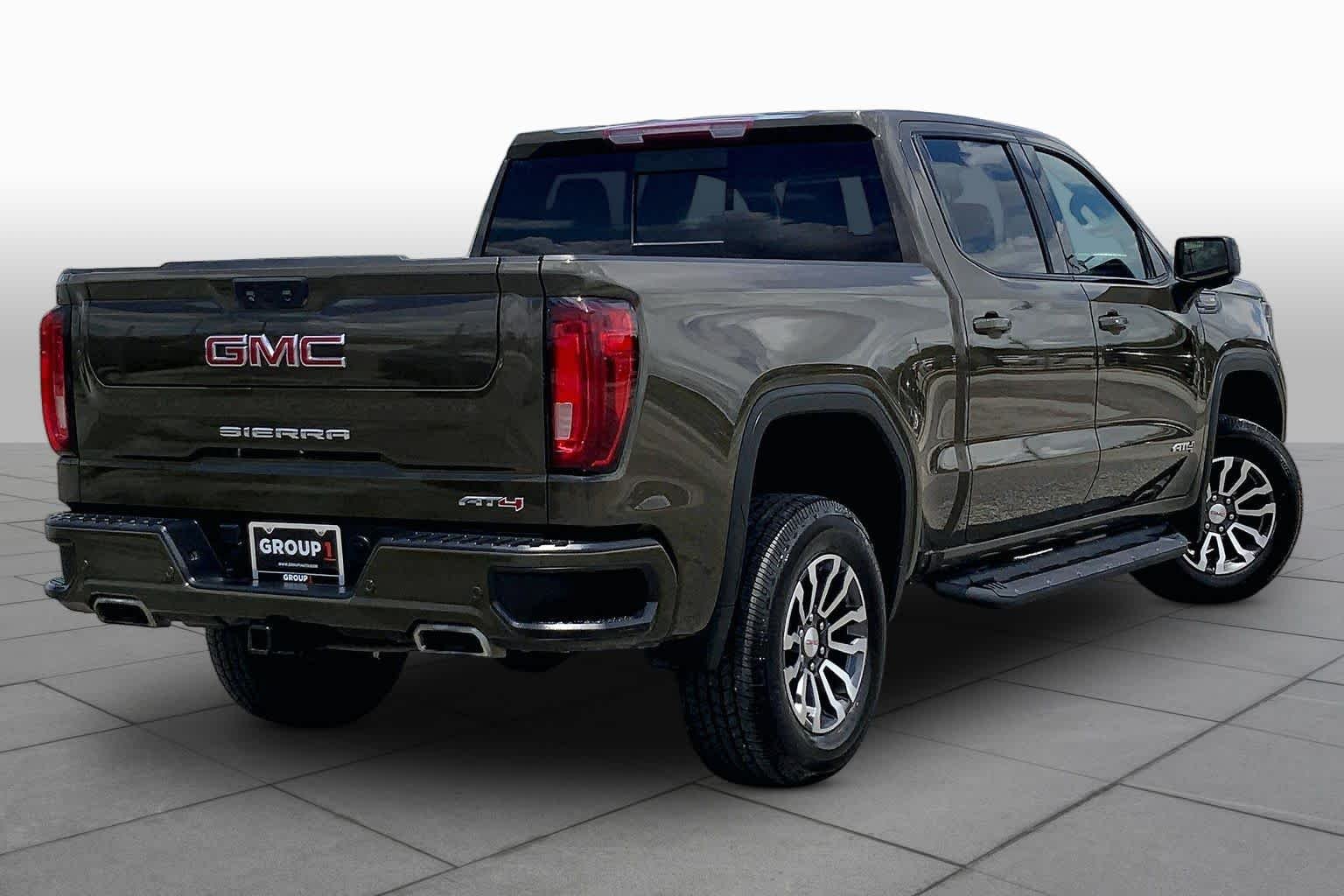 Used 2023 Deep Bronze Metallic GMC AT4 image 13