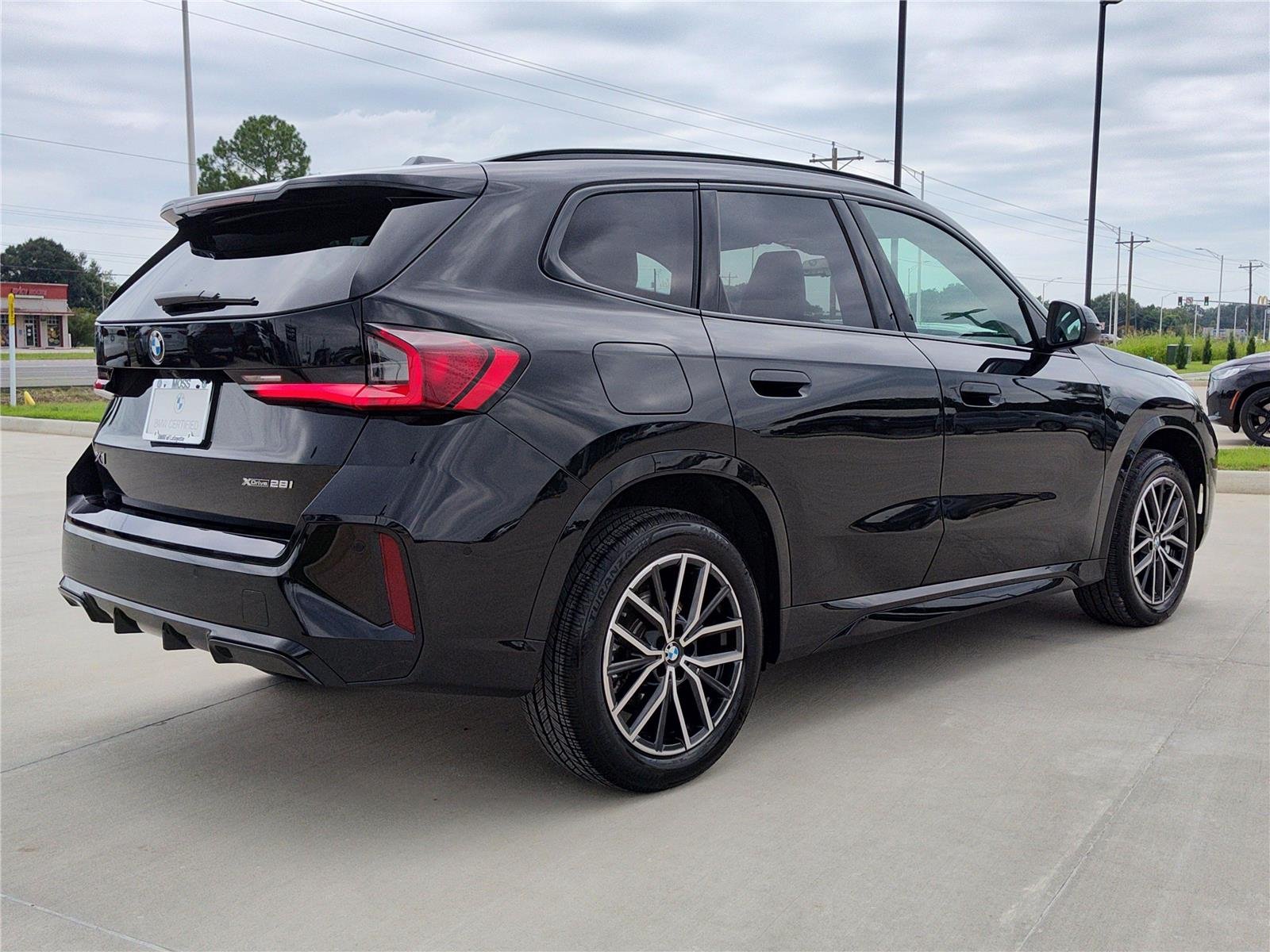 Certified Used 2025 Black Sapphire Metallic BMW xDrive28i image 9