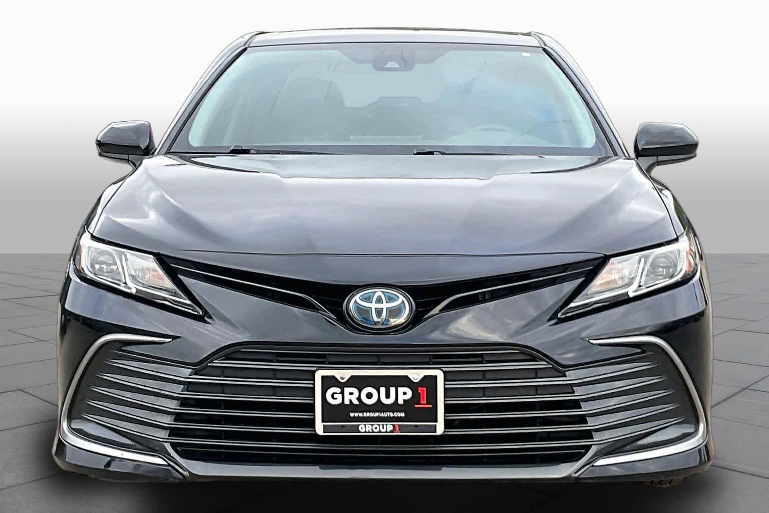 Used 2022 Midnight Black Metallic Toyota Hybrid LE image 4