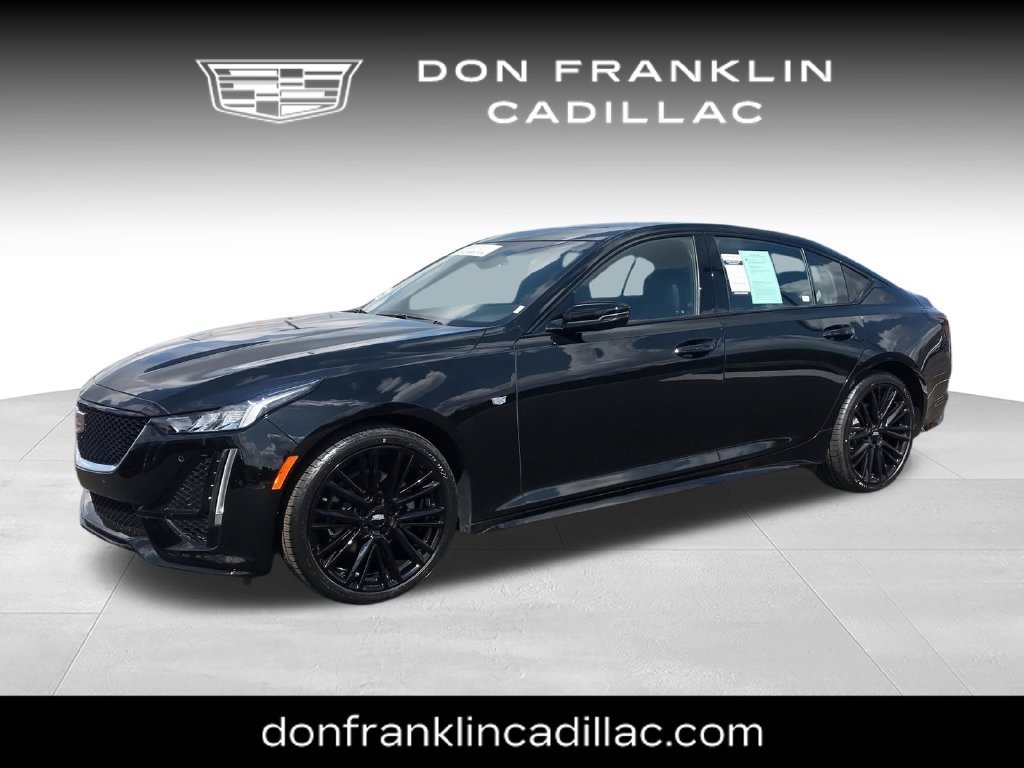 Used 2024 Black Cadillac Sport image 1