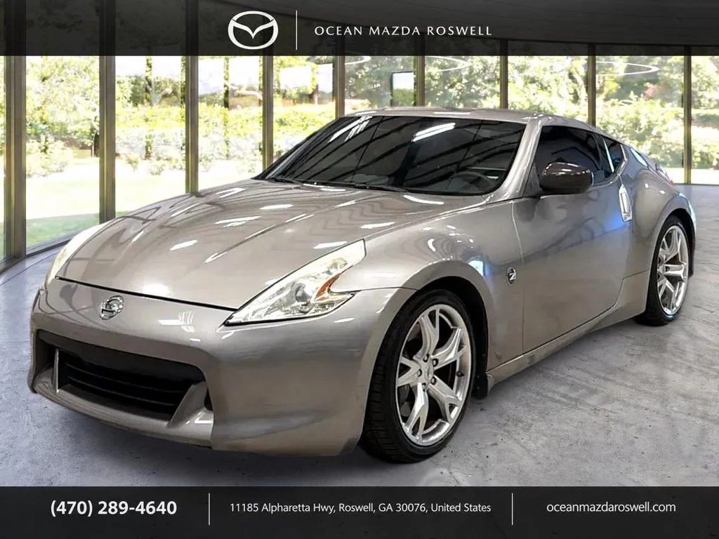 Used 2009 Gray Nissan Touring image 1