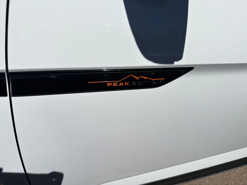 Certified Used 2025 Pure White Volkswagen Peak Edition 4Motion image 11