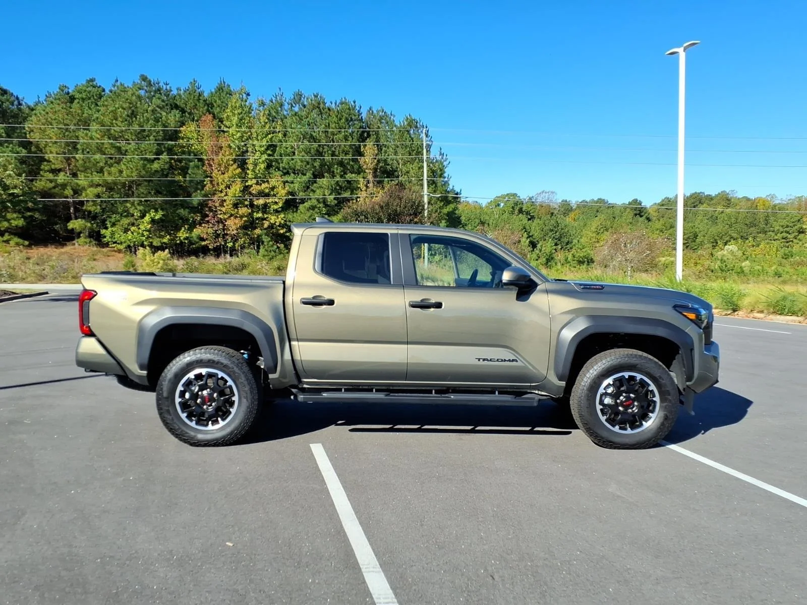 Used 2025 Bronze Oxide Toyota TRD Off Road Hybrid image 10