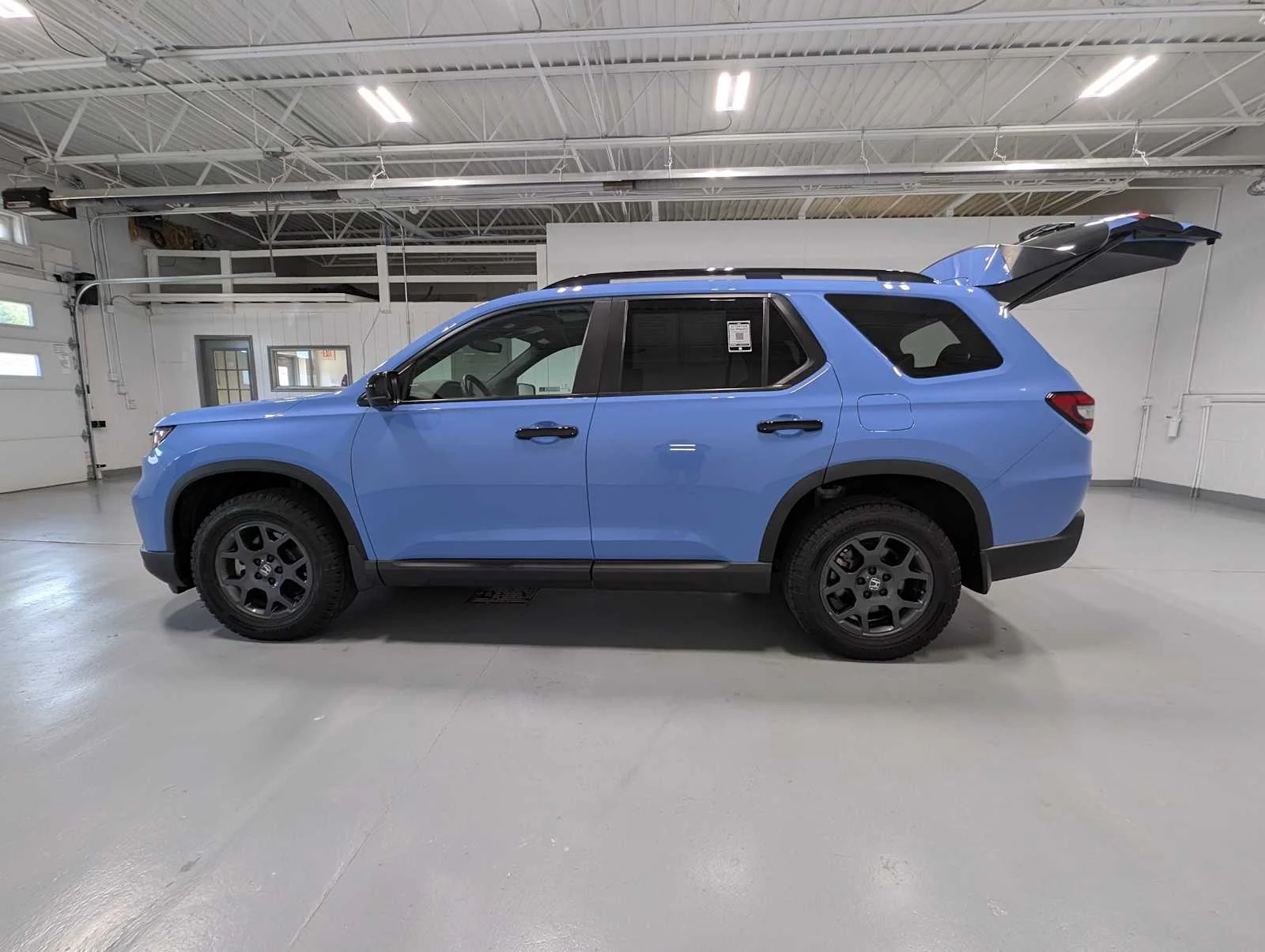 Certified Used 2023 Diffused Sky Pearl Honda AWD TRAILSPORT image 12