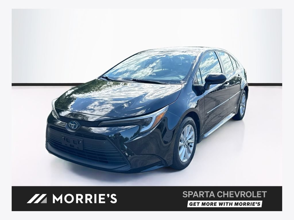 Used 2023 Black Toyota LE Hybrid image 1