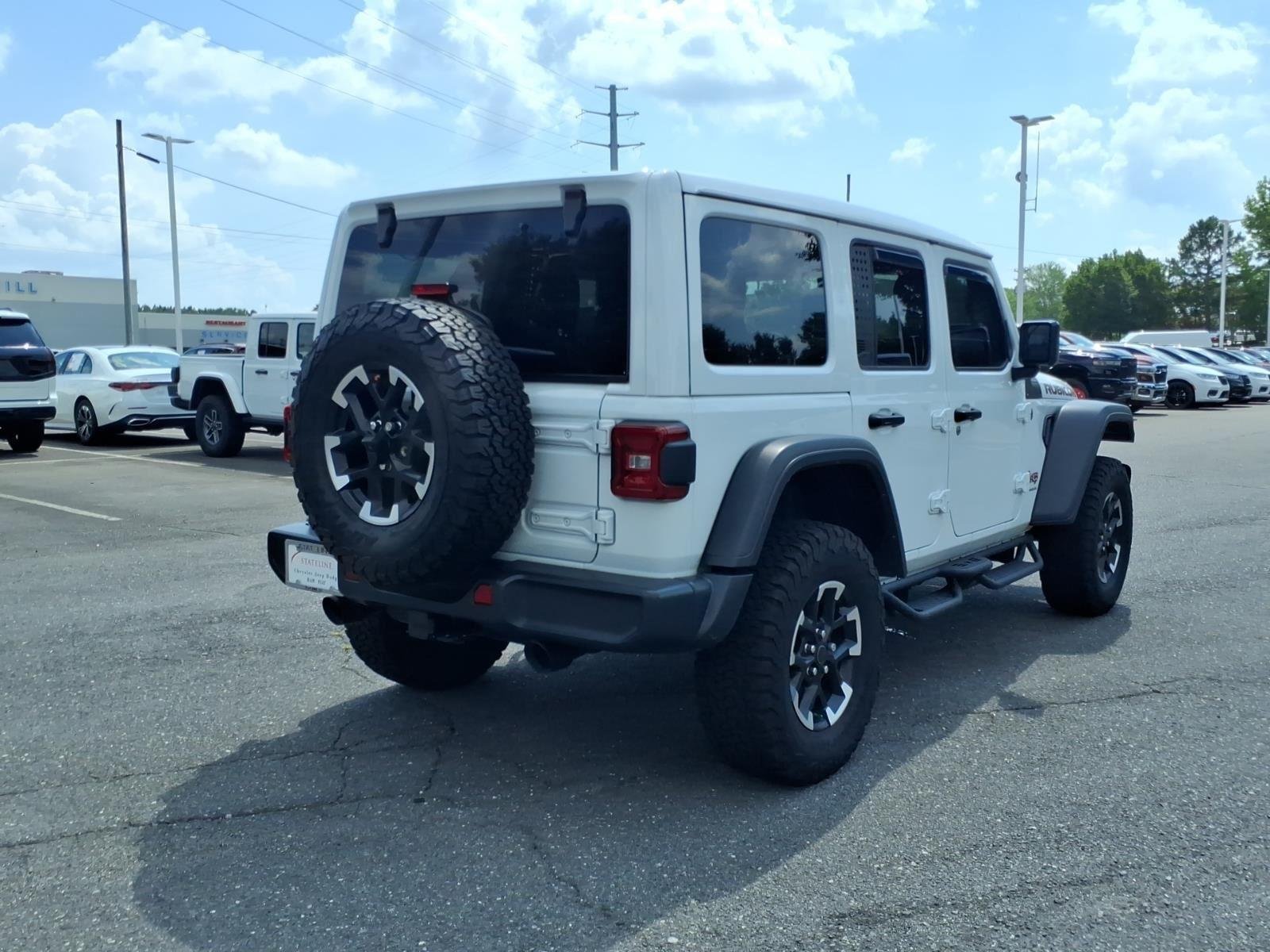 Used 2025 Bright White Clearcoat Jeep Rubicon image 2