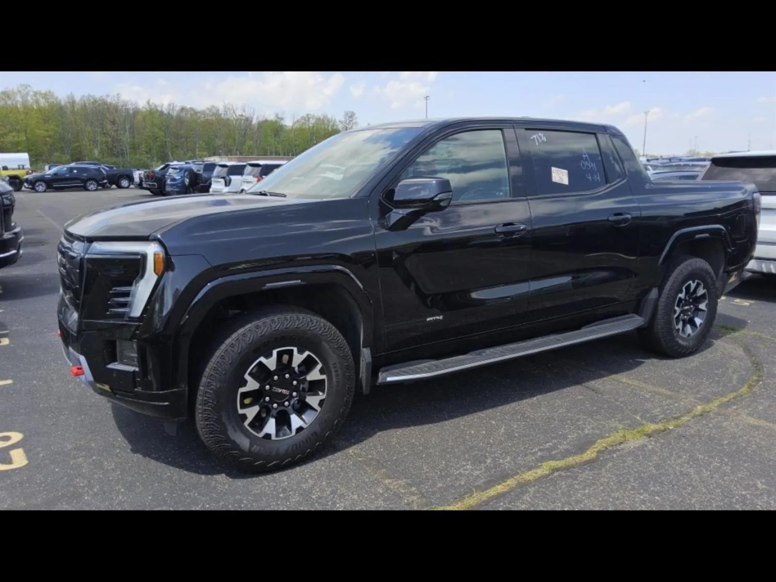 2026 GMC Sierra AT4 Max Range Crew Cab e4WD's photo