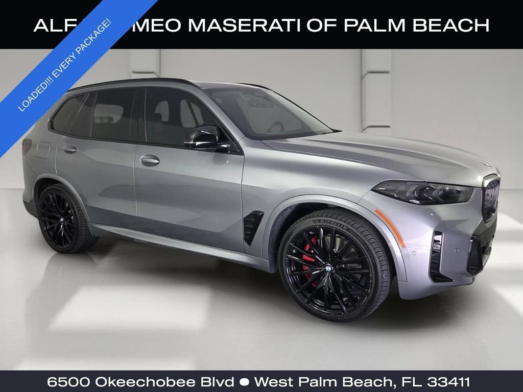 Certified Used 2024 Skyscraper Grey Metallic BMW M60i image 1
