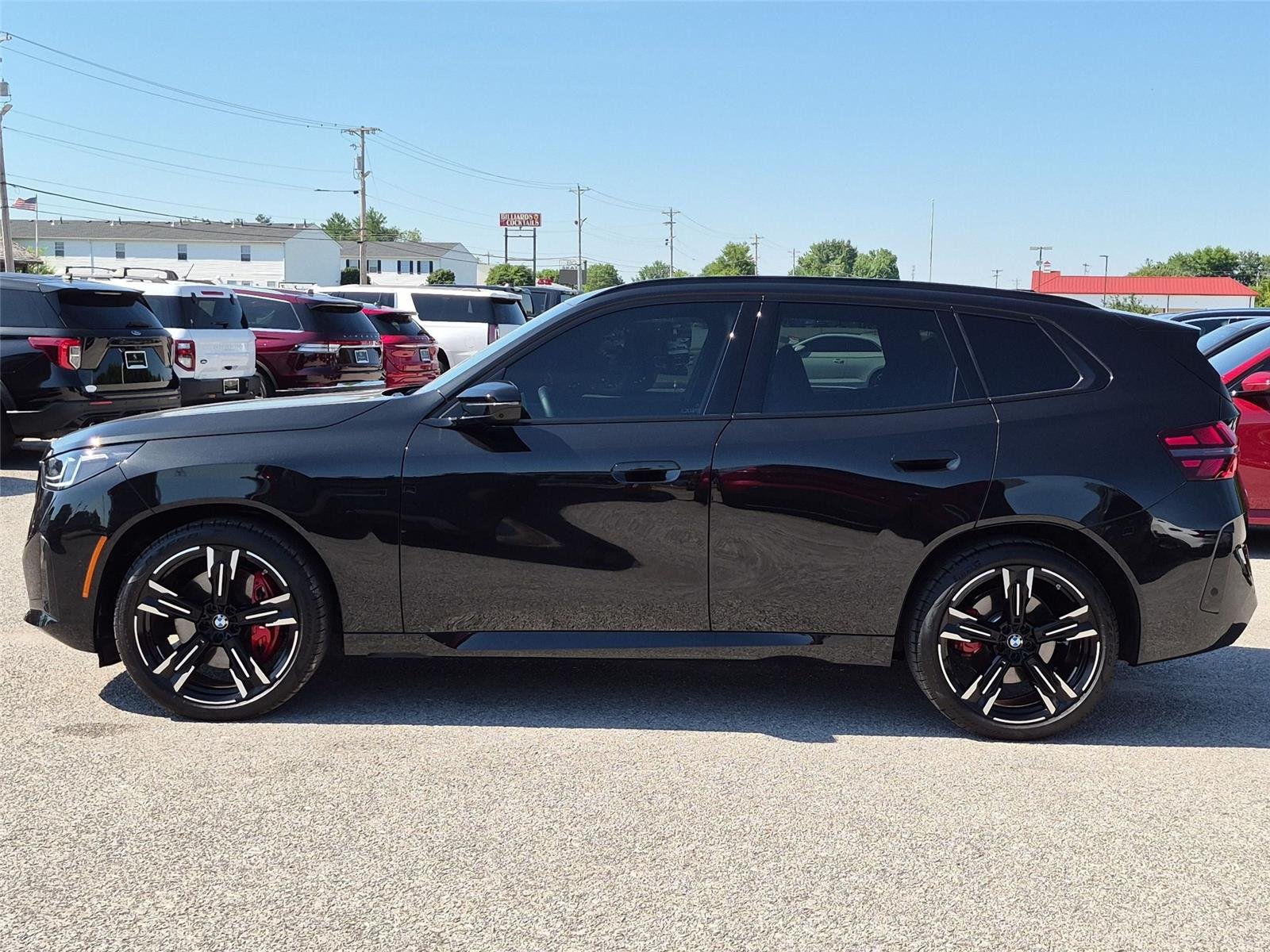 Used 2026 Black Sapphire Metallic BMW M50 xDrive image 2