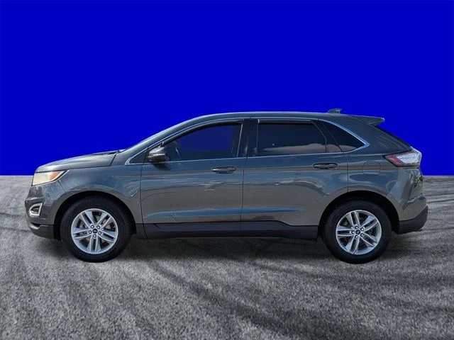 Used 2016 Magnetic Metallic Ford SEL image 7