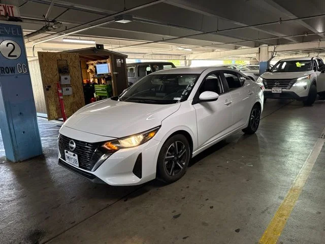Used 2024 White Nissan SV image 1