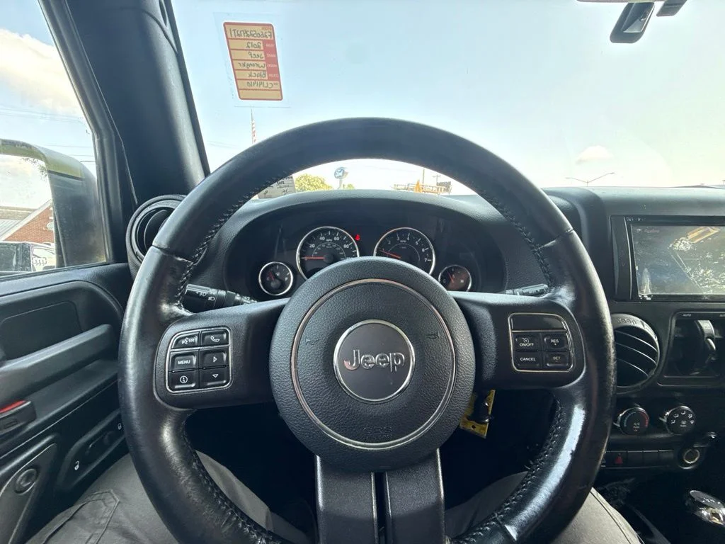 Used 2012 Black Jeep Unlimited Sport image 20