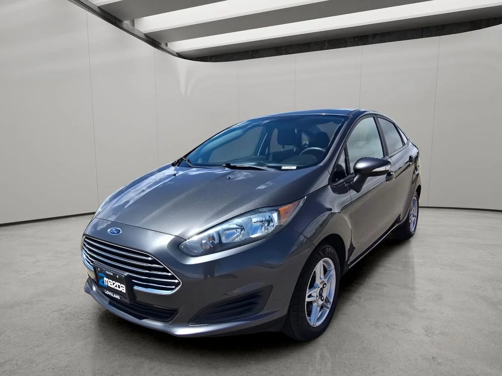 Used 2019 Magnetic Metallic Ford SE image 1