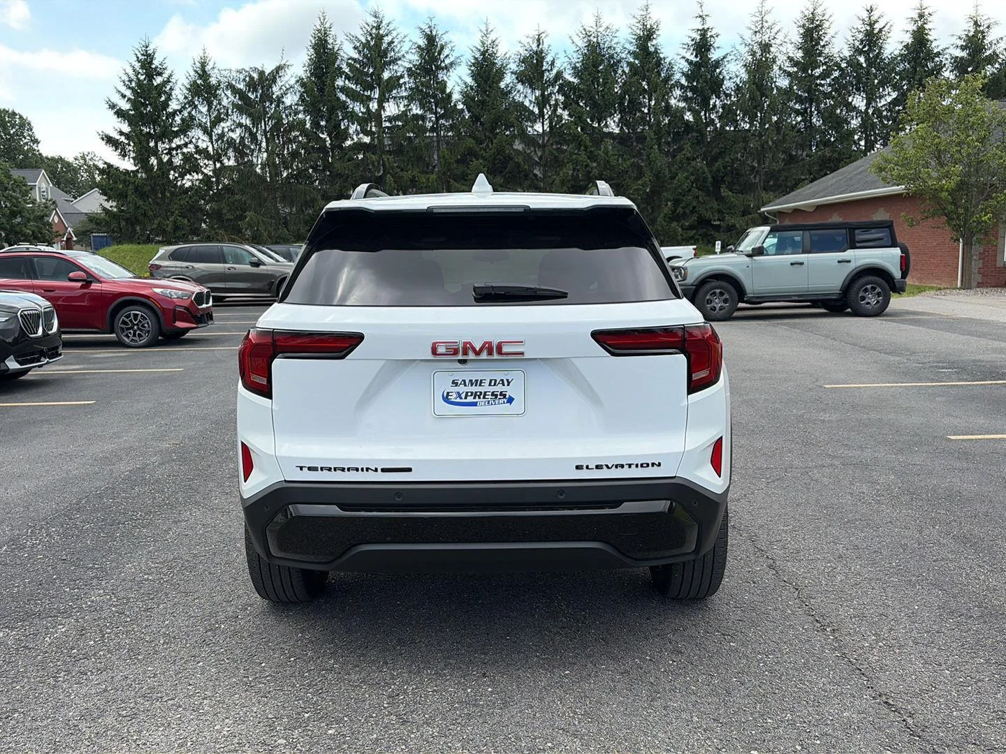 Used 2026 Summit White GMC AWD Elevation image 5