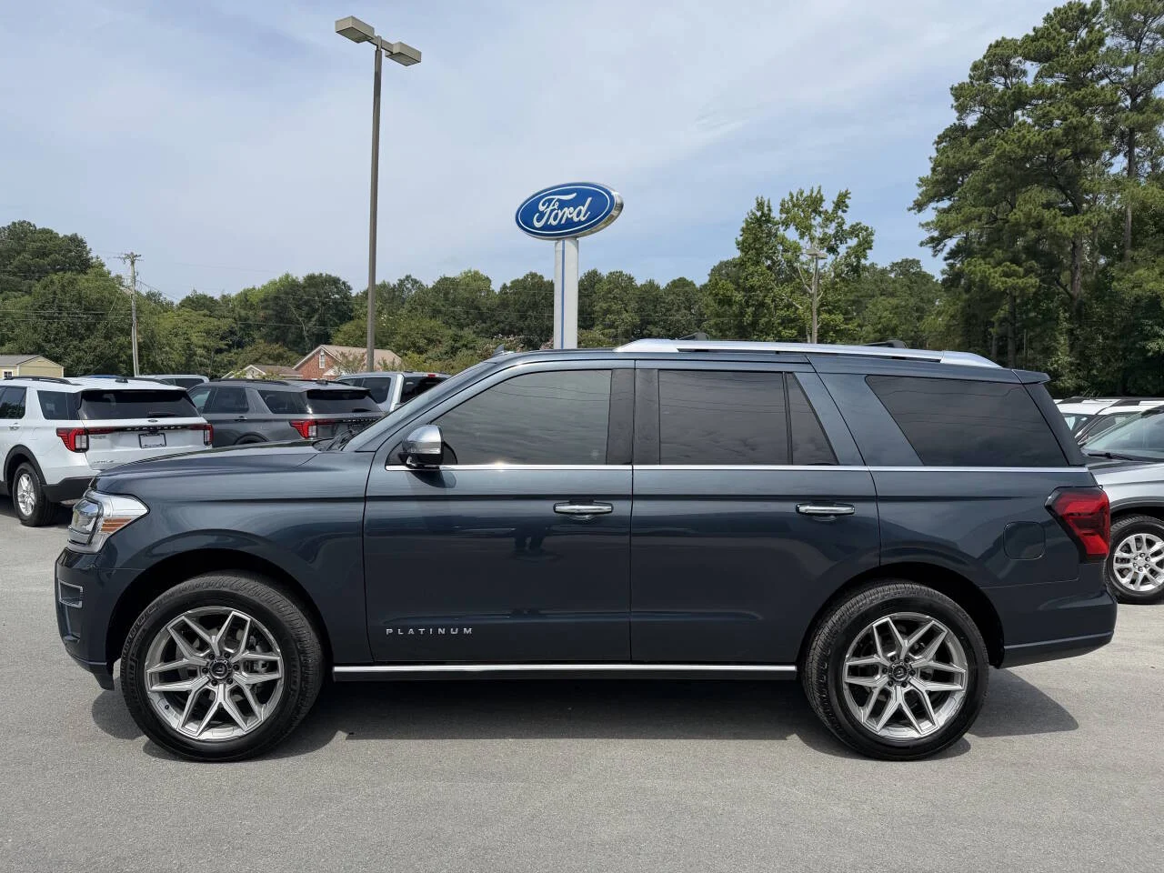 Used 2023 Stone Blue Ford Platinum 4x4 4dr SUV image 2