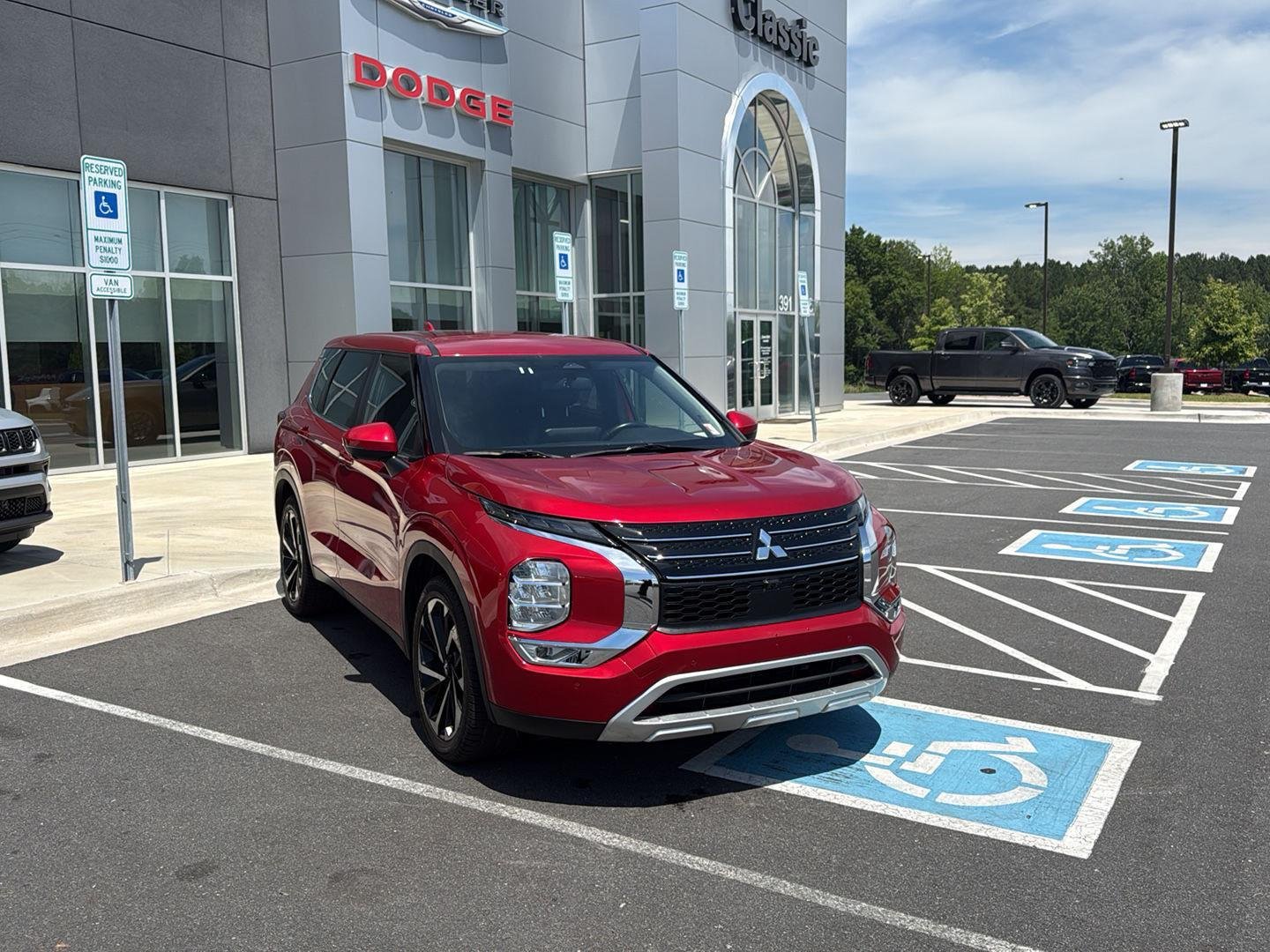 Used 2024 Red Diamond Mitsubishi SE image 4