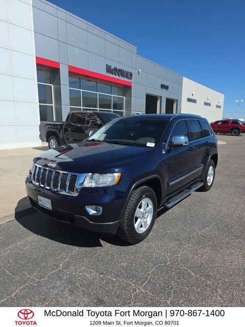 Used 2012 Blue Jeep Laredo image 1