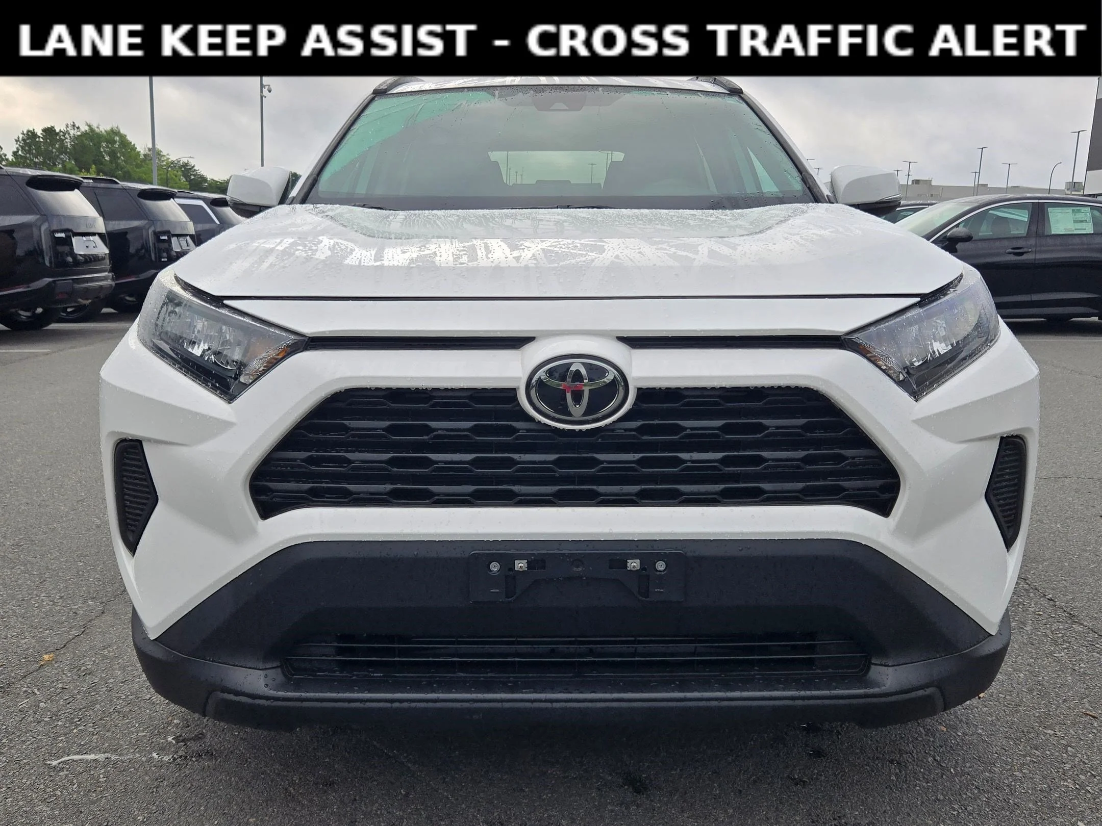 Used 2021 Super White Toyota LE image 2