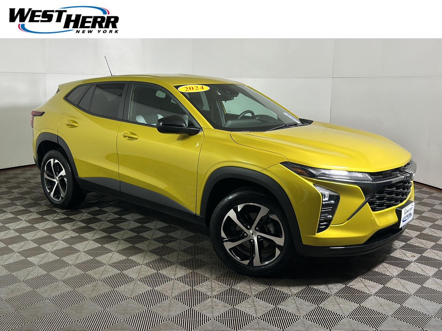Used 2024 Nitro Yellow Metallic Chevrolet RS image 1