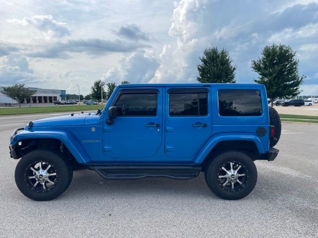 Used 2015 Blue Jeep Unlimited Sahara image 5