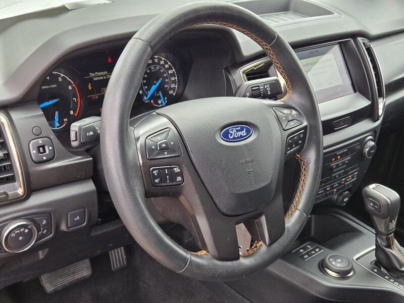 Used 2022 Orange Metallic FORD XLT 4WD SUPERCREW 5