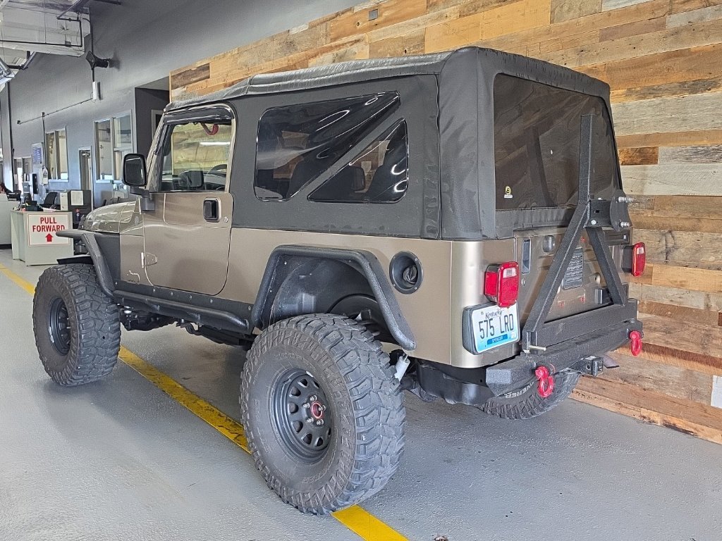 Used 2004 Light Khaki Metallic Jeep Unlimited image 4
