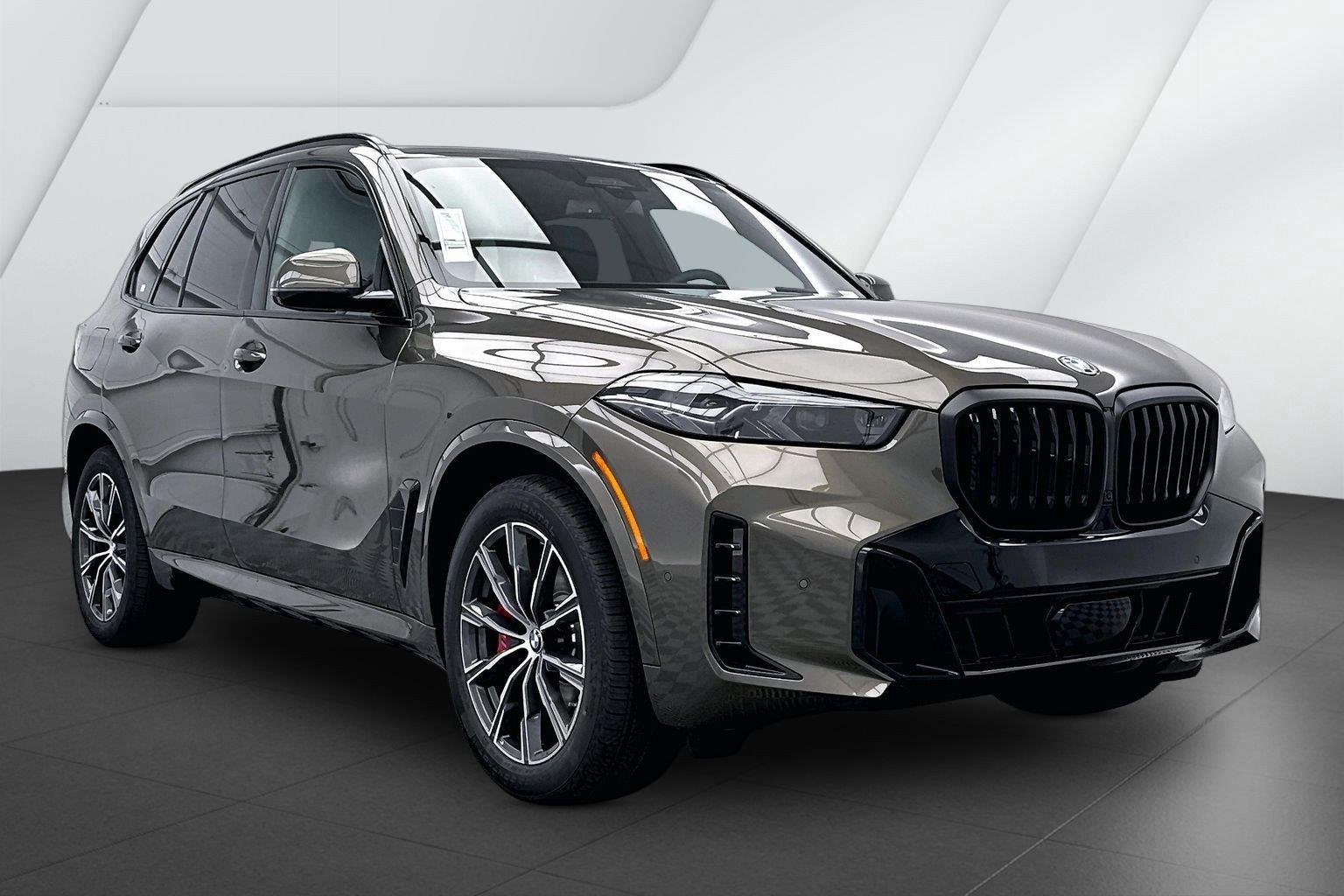 New 2026 Manhattan Green Metallic BMW xDrive50e image 1