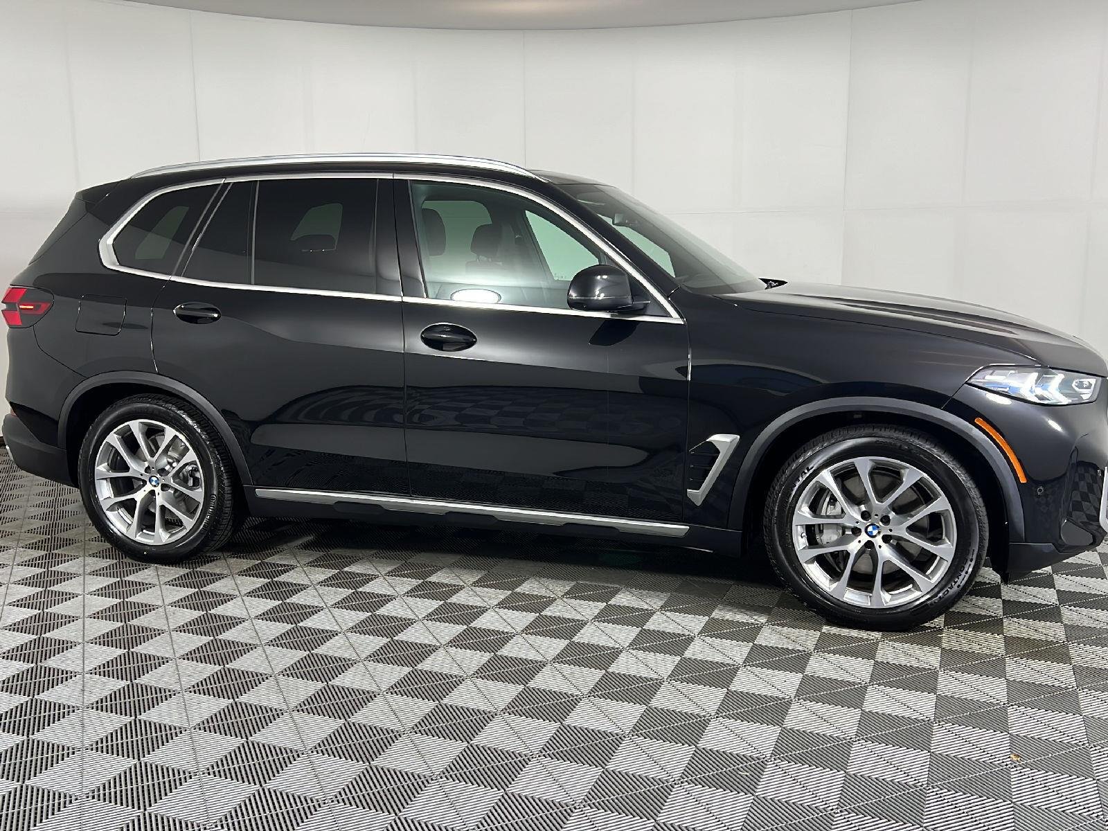 New 2026 Black Sapphire Metallic BMW xDrive50e image 2