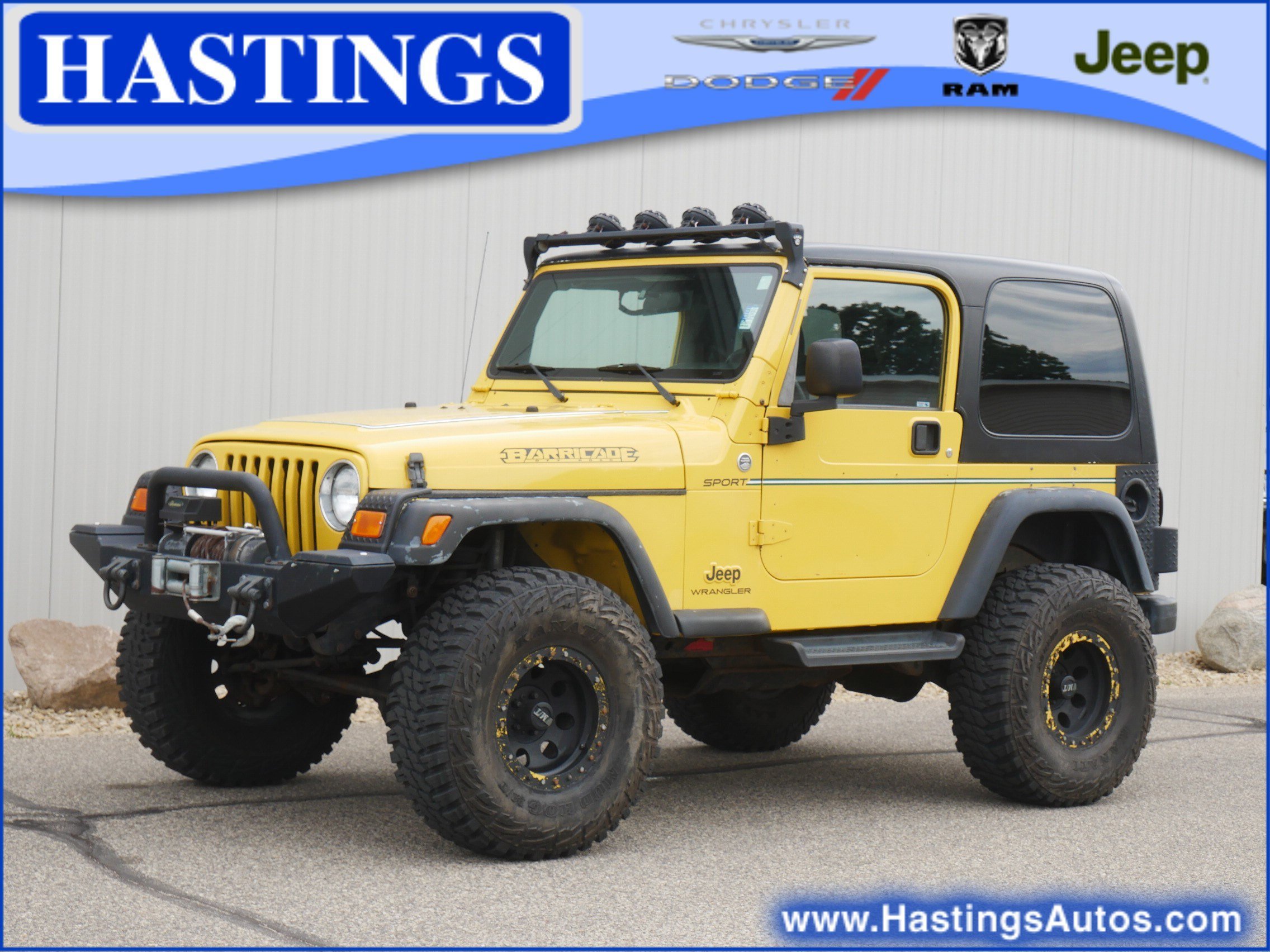 Used 2006 Yellow Jeep Sport image 1