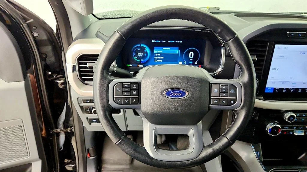 Used 2023 Agate Black Metallic Ford XLT 4WD SuperCrew 5.5