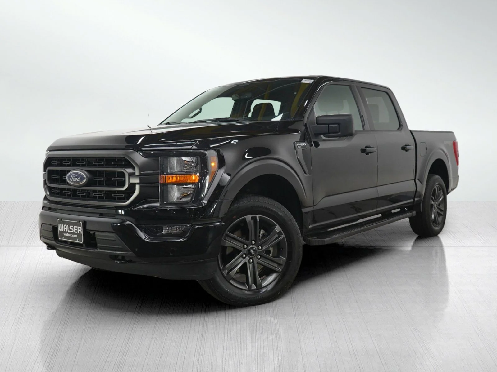 Used 2023 Agate Black Metallic Ford XLT image 1