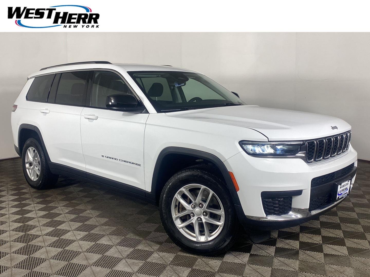 Used 2023 Bright White Clearcoat Jeep Laredo image 1
