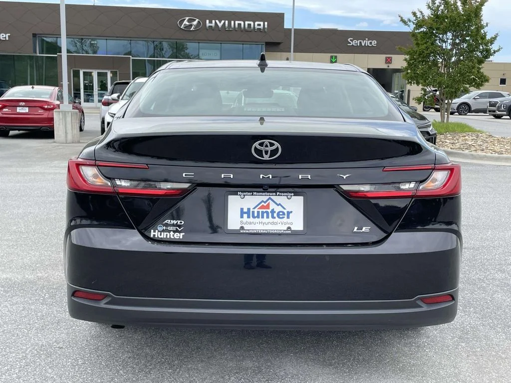 Used 2025 Midnight Black Metallic Toyota LE image 26