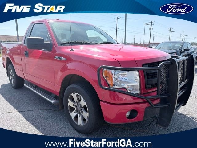 Used 2013 Red Ford STX image 1