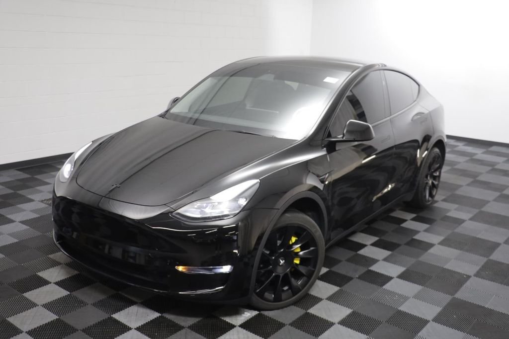 Used 2024 Tesla Model Y Long Range with VIN 7SAYGDEE6RA277972 for sale in Naperville, IL