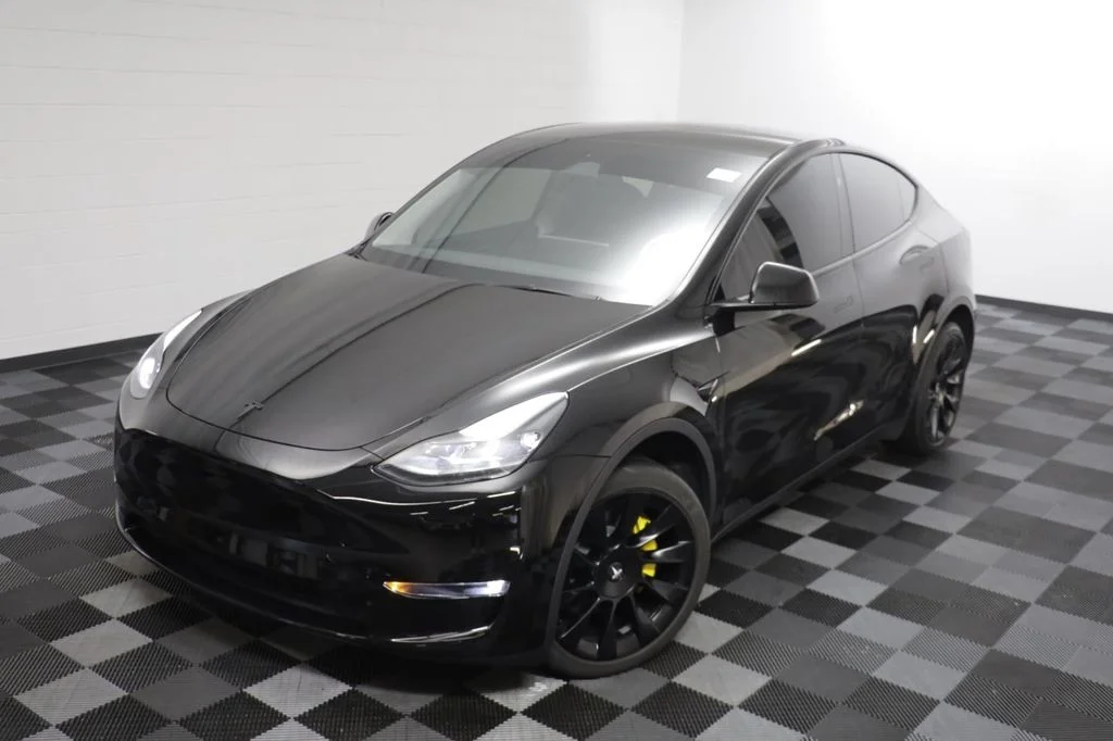 Used 2024 Tesla Model Y Long Range with VIN 7SAYGDEE6RA277972 for sale in Naperville, IL